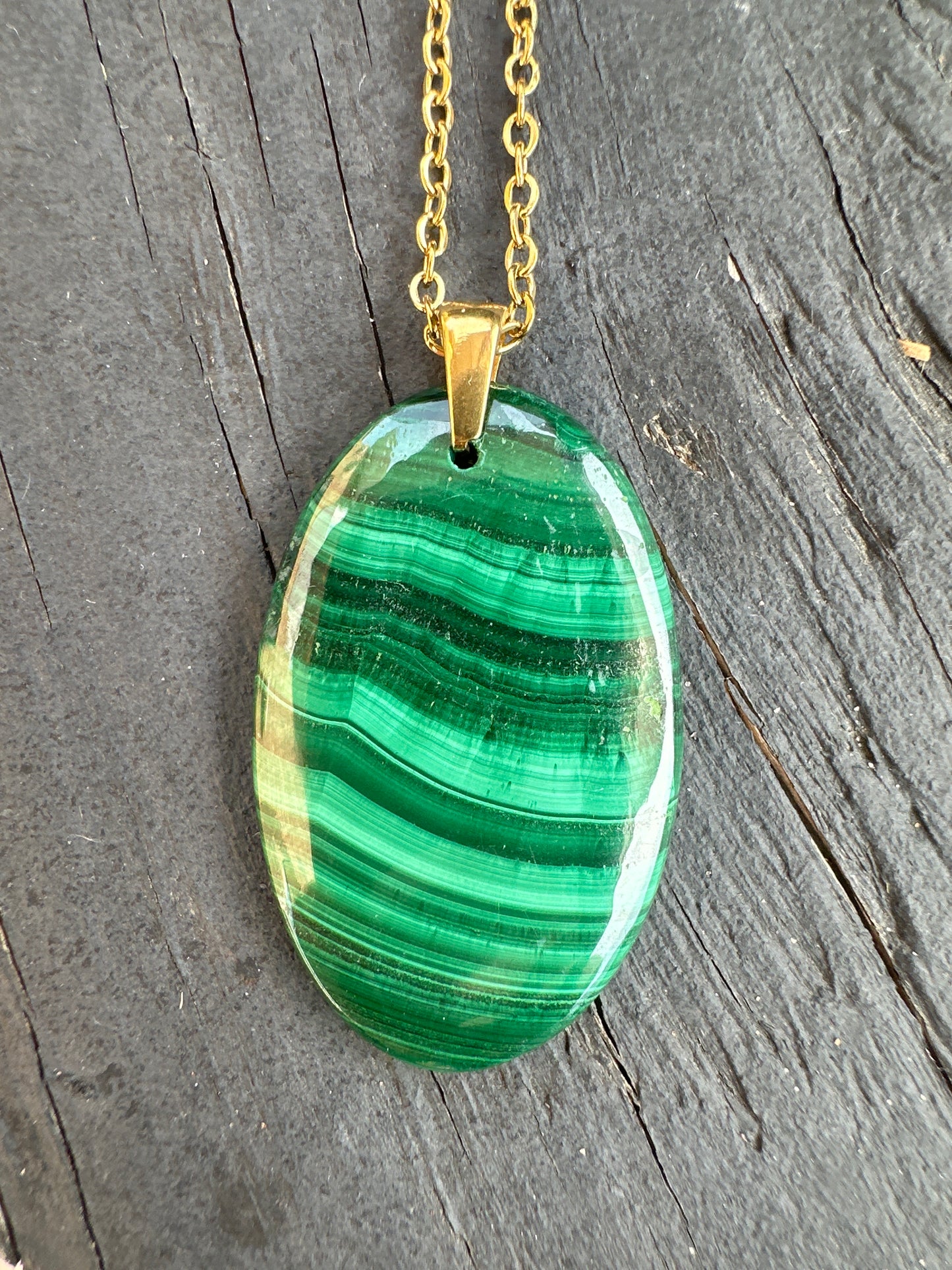 Malachite banded pendant on gold stainless steel chain