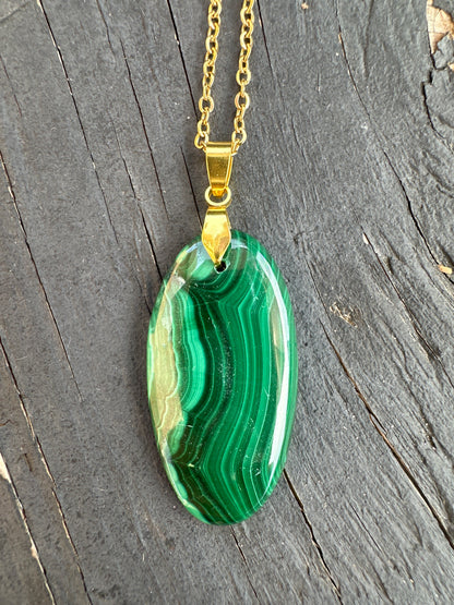 Malachite oval pendant on gold stainless steel chain