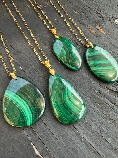 Four Malachite pendants on gold stainless steel chains