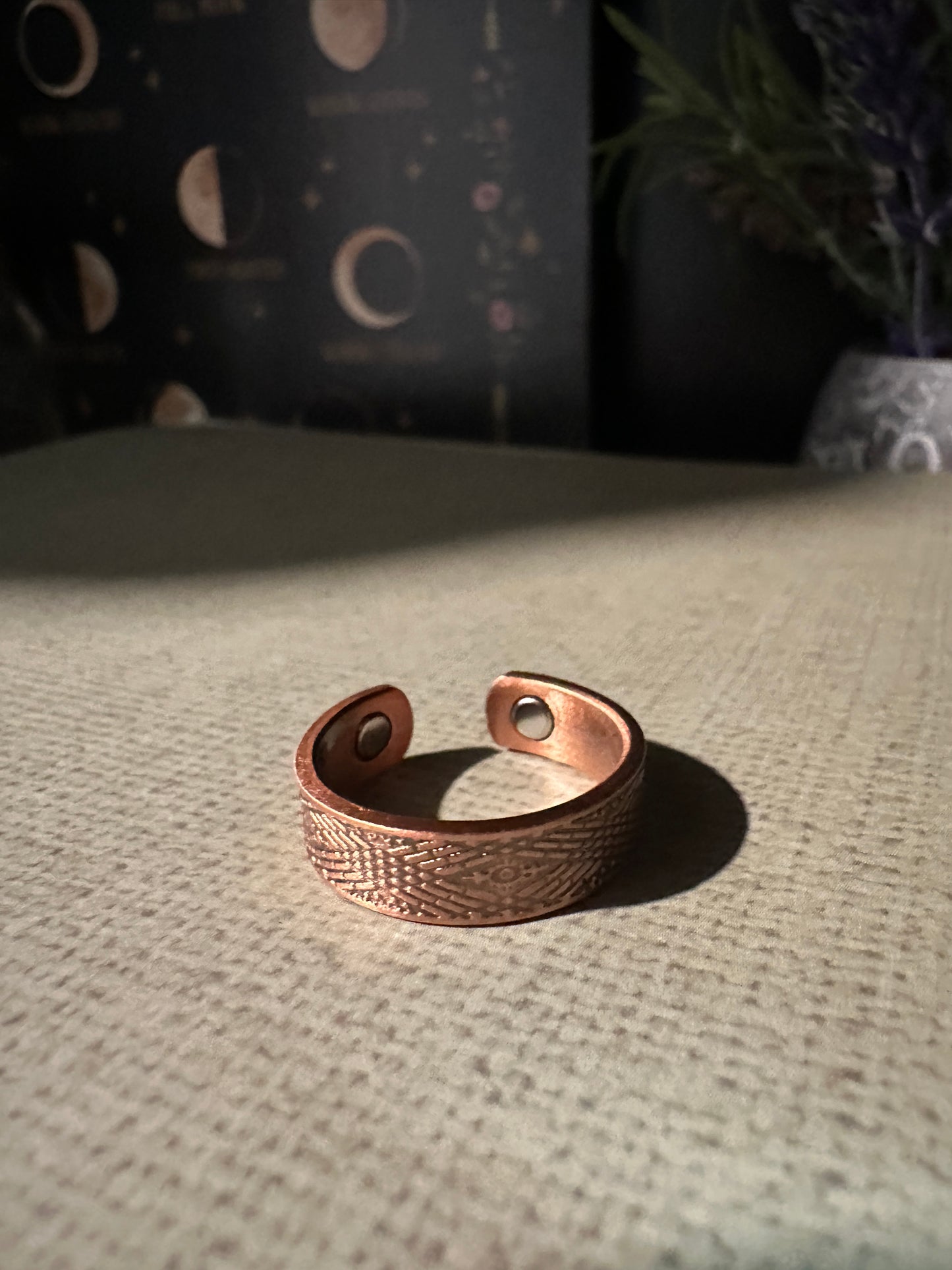 Copper ring with magnets evil eye design