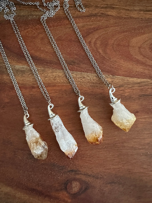 Necklaces with crystal pendants on a stainless steel chain